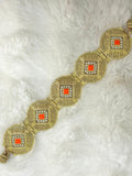 Ceinture métallique orange et dorée